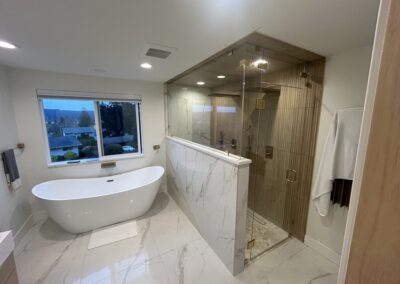 Clear Glass Shower with Brushed Brass hardware